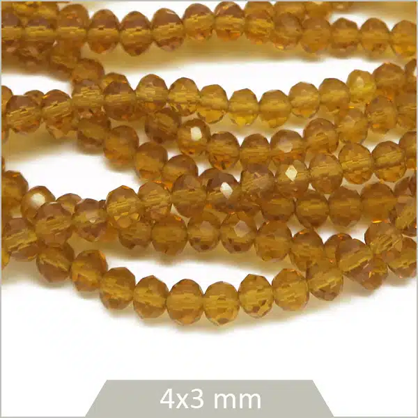 Env. 120 perles de verre à facettes donut miel transparent 4x3 mm