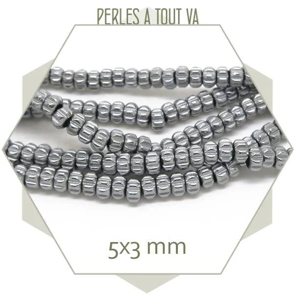 Env. 128 perles donut en hématite couleur argent