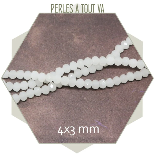Env. 110 perles de verre à facettes donut blanches 4x3 mm