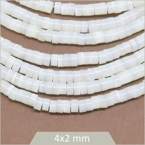 Env. 172 perles heishi en coquillage 4x2 mm