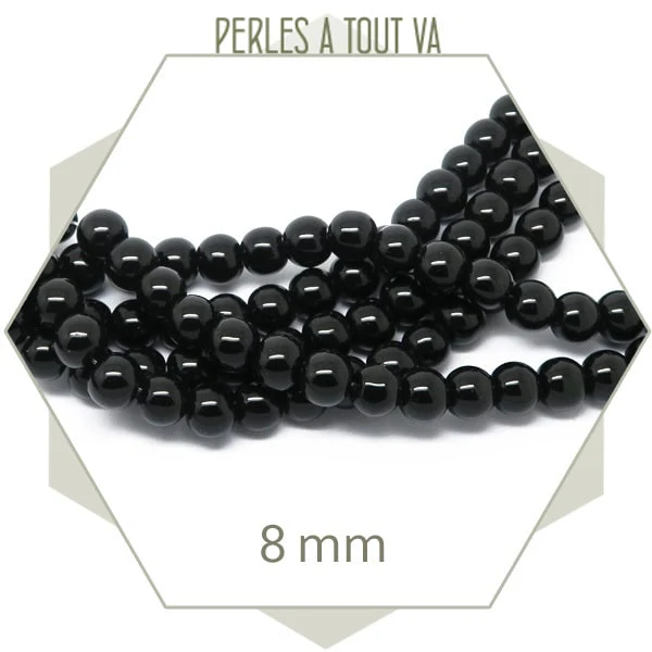 Env. 40 perles de verre rondes 8 mm noires
