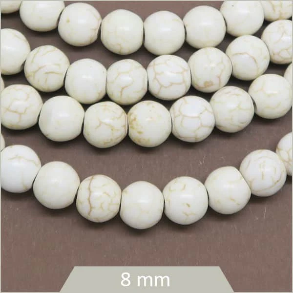 Env. 46 perles rondes en Howlite teintée crème, 8 mm