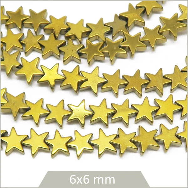 Env. 85 perles étoiles en hématite doré métallisé 6 mm