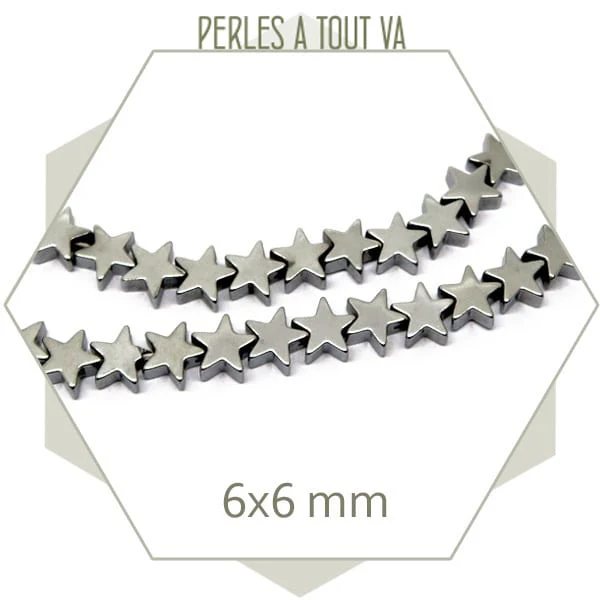 Env. 74 perles étoiles en hématite couleur argent