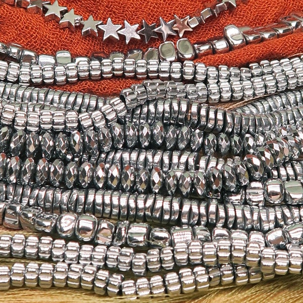 Env. 74 perles étoiles en hématite couleur argent - Image 2