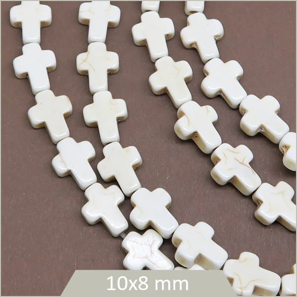 8 petites perles croix en Howlite teintée crème
